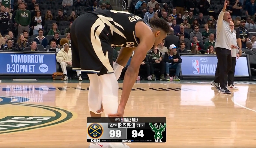 pg电子游戏官网官方网站-沮丧！字母哥小腿不舒服啊 走去球员通道又回了替补席！